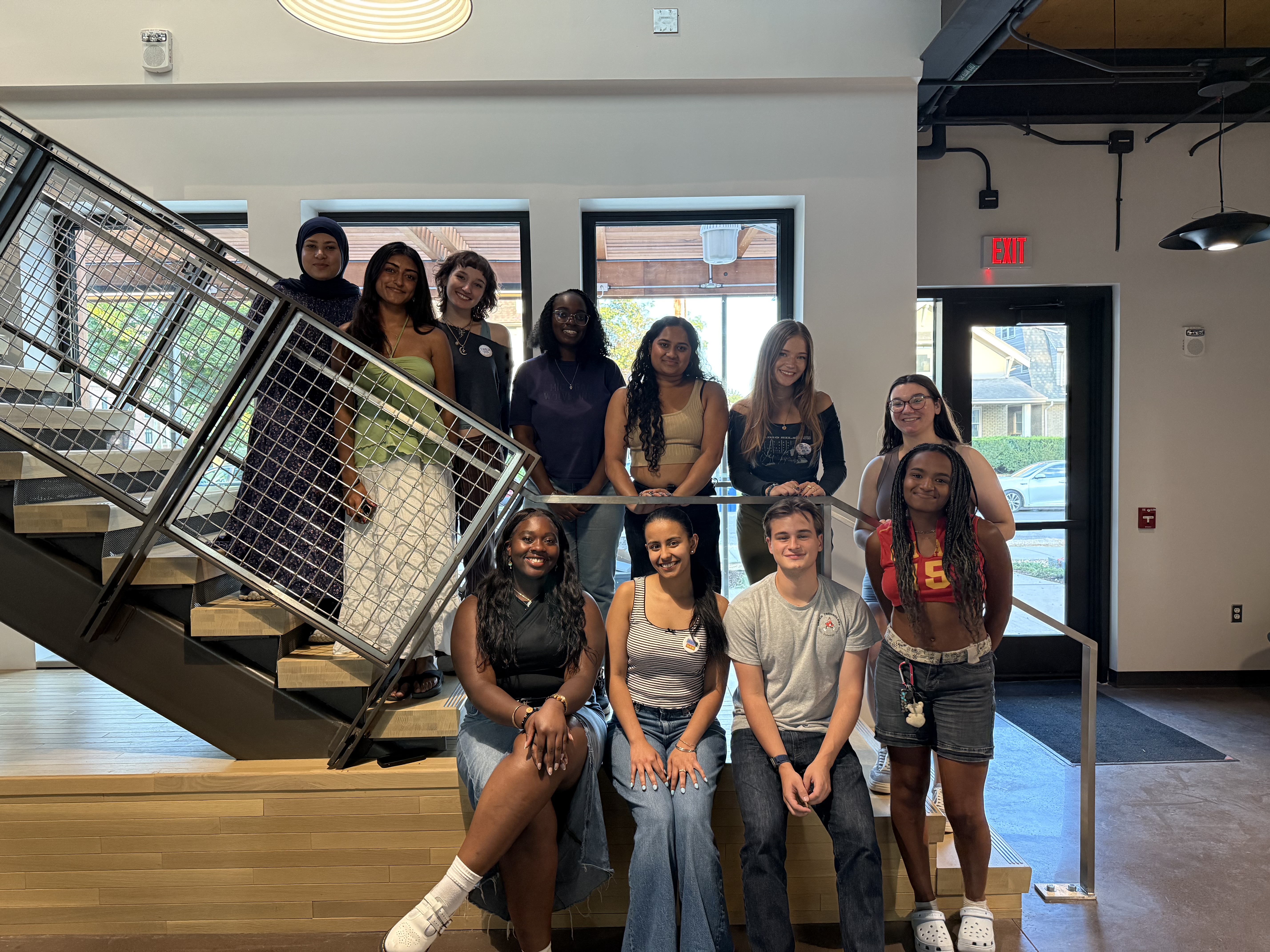 Student Advisory Board standing on the Ginsberg Center stairs. 