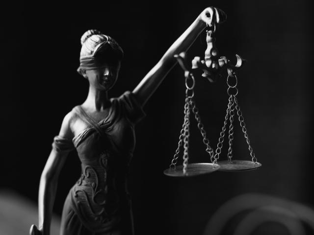 Blindfolded Lady Justice with scales